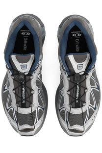 Salomon unisex xt whisper sneaker silver gray and white running shoes with blue accents mesh upper and black laces