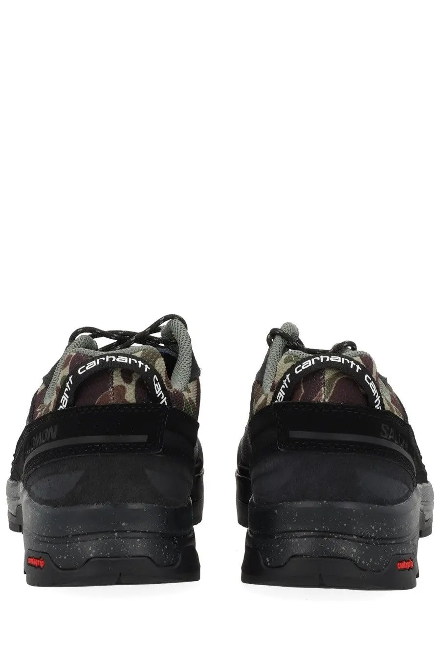 Black and camouflage carhartt hiking shoes with rugged speckled rubber sole salomon x carhartt wip sneaker