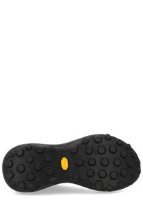 Satisfy men’s sneaker therocker brown with black rubber sole circular tread and yellow Vibram logo in the center