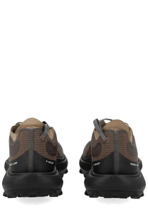 Brown and black satisfy men’s sneaker therocker trail running shoes with mesh upper and rubber outsole shown from back side