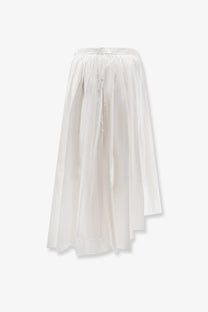A flowing white pleated cotton skirt by self portrait with a high waistband and asymmetrical hemline for women
