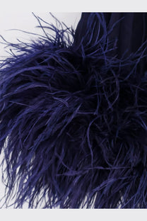 Deep purple feather trim with soft voluminous texture on self-portrait women’s chiffon long blue dress back view