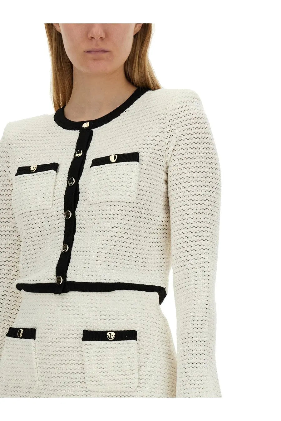 Self-portrait women’s crochet cardigan in cream-colored tweed with black trim and silver-toned buttons