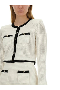 Self-portrait women’s crochet cardigan in cream-colored tweed with black trim and silver-toned buttons