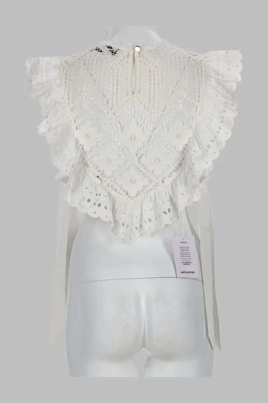 White lace crop top by self portrait with ruffled sleeves and intricate crochet con inserti in pizzo white pattern