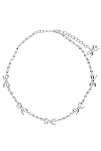 Silver chain necklace with delicate crystal bow charms by self-portrait women’s jewelry collection