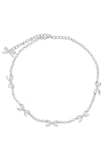A delicate silver chain necklace with sparkling diamond-encrusted bow charms from self-portrait women’s collection