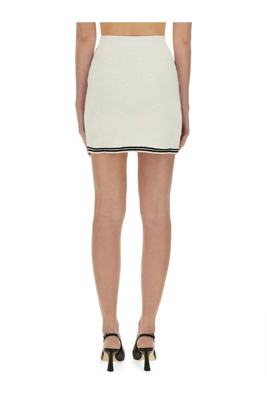Cream-colored knit mini skirt with black trim along the hem from self-portrait women’s jacquard skirt beige collection