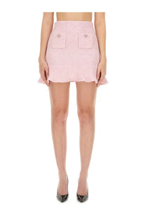 Self-portrait women’s knitted mini skirt in blue with pink tweed flared hem and decorative buttons on front pockets