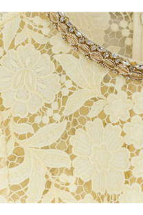 A delicate cream lace dress with an ornate gold beaded collar and clear crystal embellishments by self-portrait