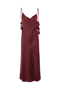 Self-portrait women’s long burgundy satin slip dress with delicate tied straps and matching fabric tassels at the shoulders