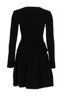 Black long-sleeved peplum mini dress by self portrait with fitted bodice and flared skirt for women