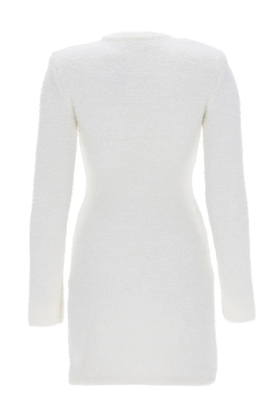 A sleek white long-sleeved ribbed knit mini dress by self-portrait with a fitted silhouette