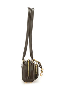 Dark brown patent leather self-portrait women’s mini shoulder bag with gold-tone zippers and snake-shaped charm