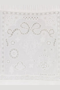A delicate white embroidered ramie square scarf with intricate lace patterns and a central bow design for women