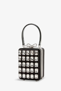 Black satin self-portrait women’s shoulder bag featuring a rectangular clutch design with clear crystal grid and silver bow handle
