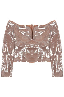 A shimmering rose gold sequined off-the-shoulder crop top with long sleeves and a central zipper by self-portrait