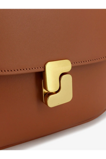 Soeur women’s bellissima mini leather crossbody bag in tan with a distinctive gold-tone s-shaped clasp
