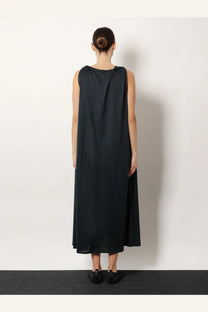 Black sleeveless flowing maxi dress with draped shoulder detail made from organic cotton by soeur in blue