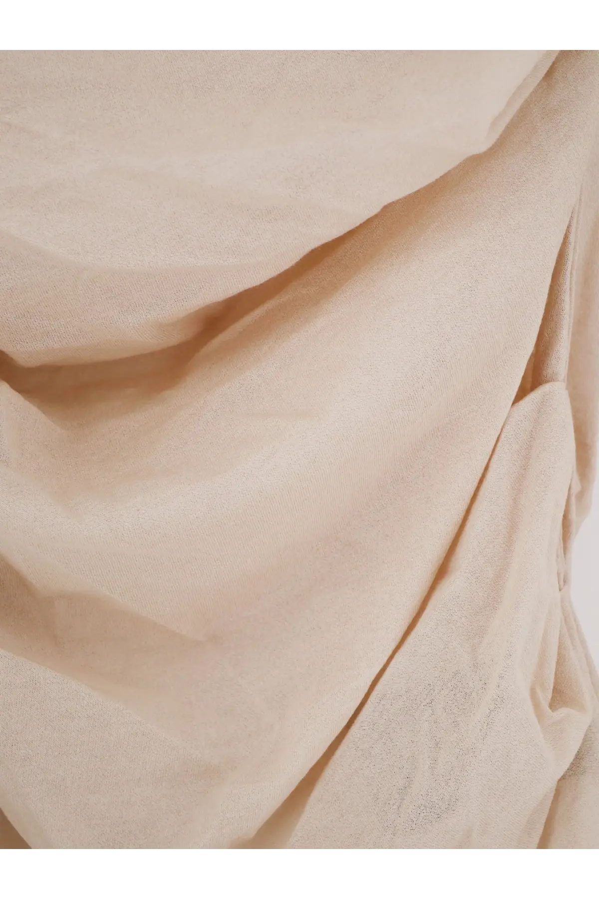 A soft cream-colored soeur womens gaia extra fine cotton crêpe top with delicate lightweight texture and subtle folds