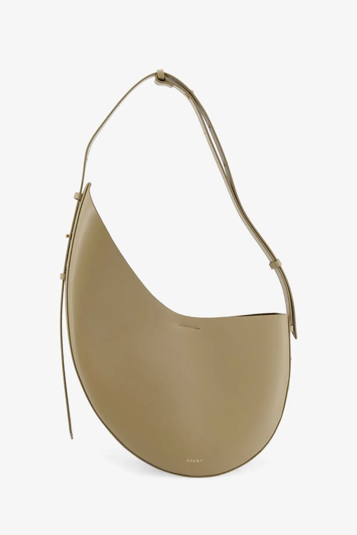 Soeur women’s Winona leather crossbody bag beige with sleek minimalist curved silhouette and adjustable slender strap