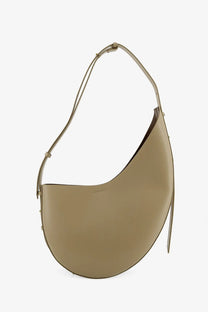 Soeur women’s winona leather crossbody bag beige with a sleek olive green leather hobo design and slender adjustable strap