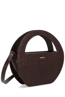 Brown crocodile-embossed circular handbag with gold-tone sofia logo on front from sofia women’s mini edda bag collection