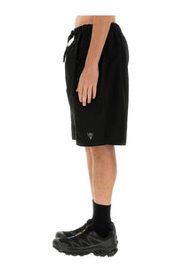 South2 west8 men’s bermuda cargo black drawstring shorts with white embroidered logo on lower left leg