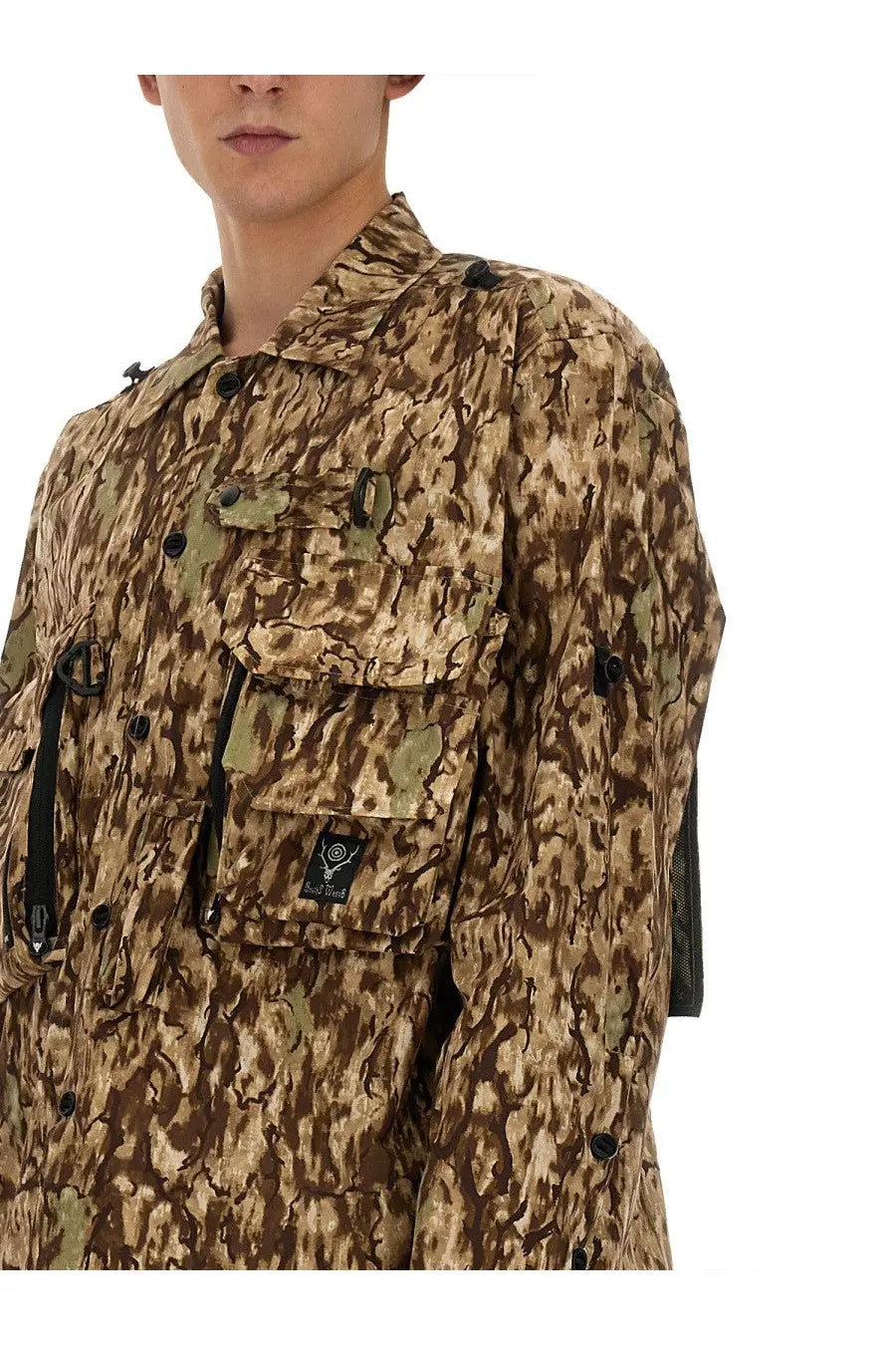 South2 West8 men’s utility jacket in brown and beige camouflage with black buttons and chest pocket brand patch