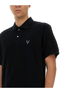 South2 West8 men’s black cotton polo shirt with short sleeves and subtle white embroidered logo on the chest