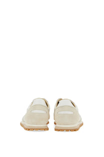 Beige suede spalwart men’s marathon trail slip-on sneakers with white accents and a tan rubber sole