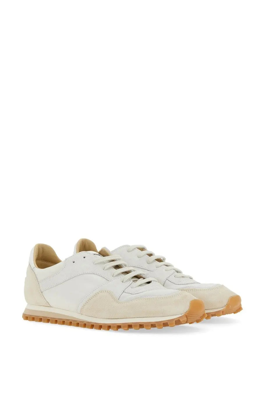 Cream-colored suede and leather spalwart men’s marathon trail sneaker with gum rubber sole in white