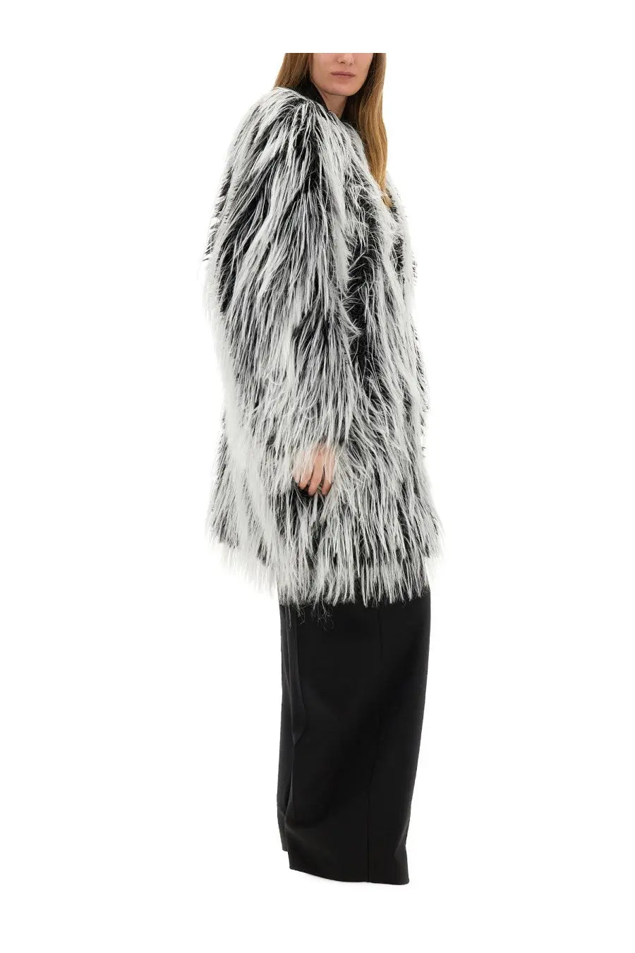 Sportmax women’s pants quito black paired with a long voluminous black and white faux fur coat with plush shaggy texture