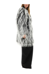 Sportmax women’s pants quito black paired with a long voluminous black and white faux fur coat with plush shaggy texture