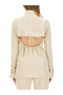 Beige sportmax women’s long-sleeved blouse with back cutout and drawstring tie shown from the back
