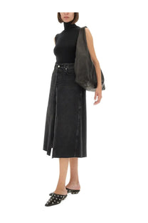 Sportmax women’s sleeveless vertigo jersey black paired with black denim midi skirt featuring central slit and raw hemline