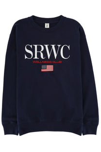 Sporty &amp; Rich unisex navy blue crewneck sweatshirt with white red srwc wellness club lettering and embroidered american flag patch