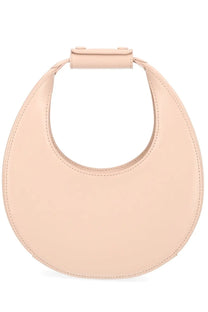 A sleek blush-pink leather handbag with a minimalist circular design and top handle by Staud Women’s Borsa Moon Mini Pink
