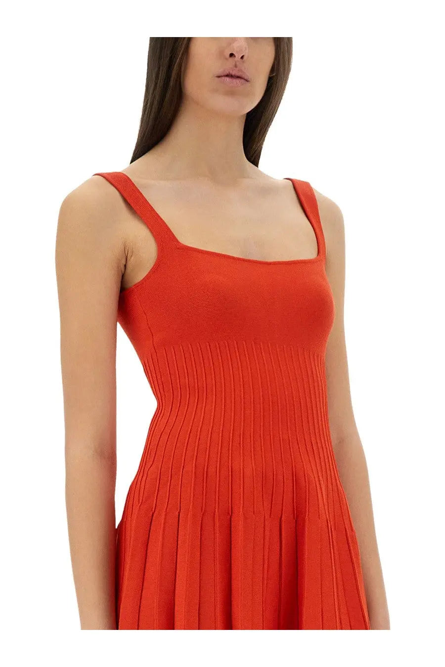 Staud women’s Ellison short dress in vibrant orange ribbed knit with sleeveless square neckline and pleated skirt