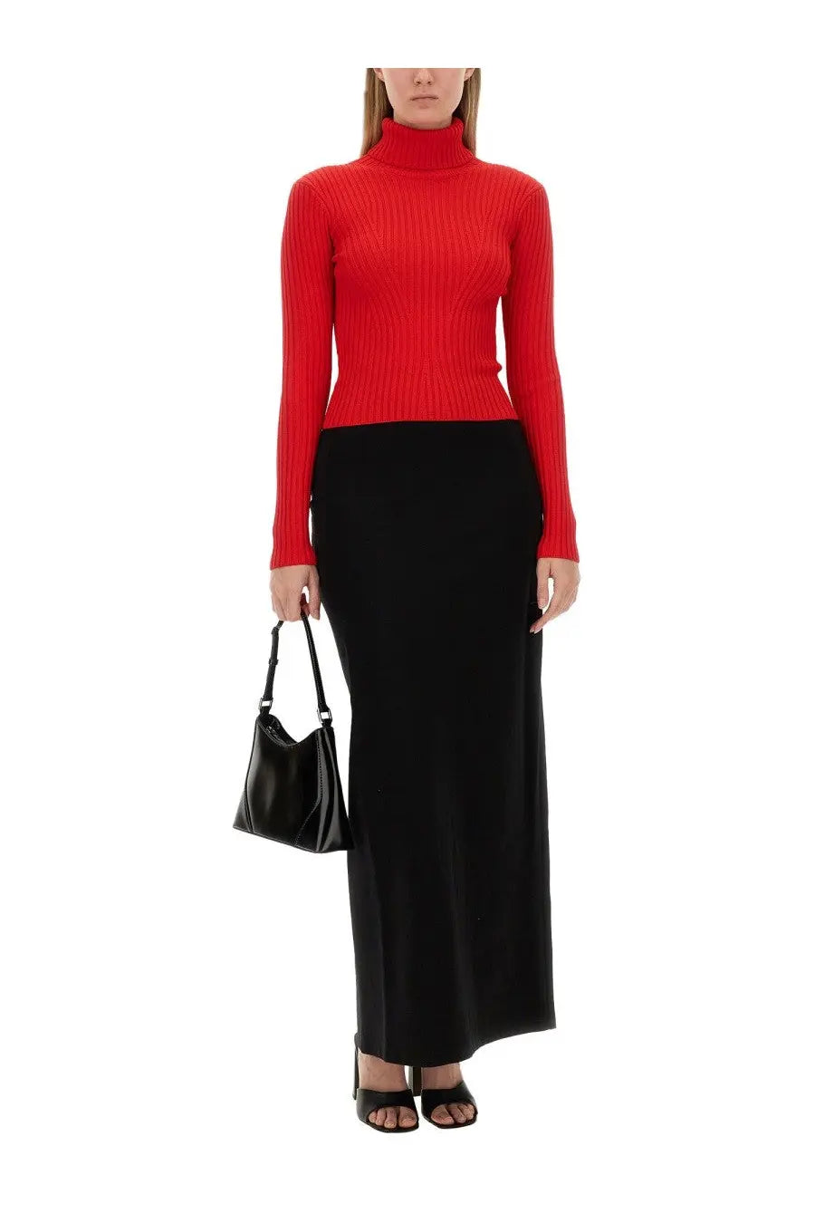 A sleek black patent leather handbag with silver hardware featured with Staud women’s Petunia skirt black