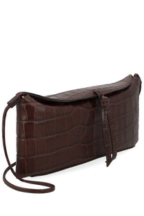 Dark brown crocodile-embossed leather clutch with detachable shoulder strap and tassel detail from Staud Women’s Pochette Eve Brown