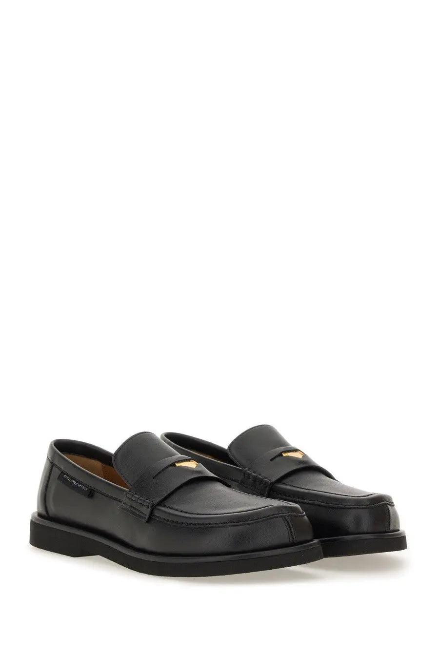 Stella McCartney women’s classic loafer Ryder black with black leather and subtle gold-tone heart emblem on the vamp