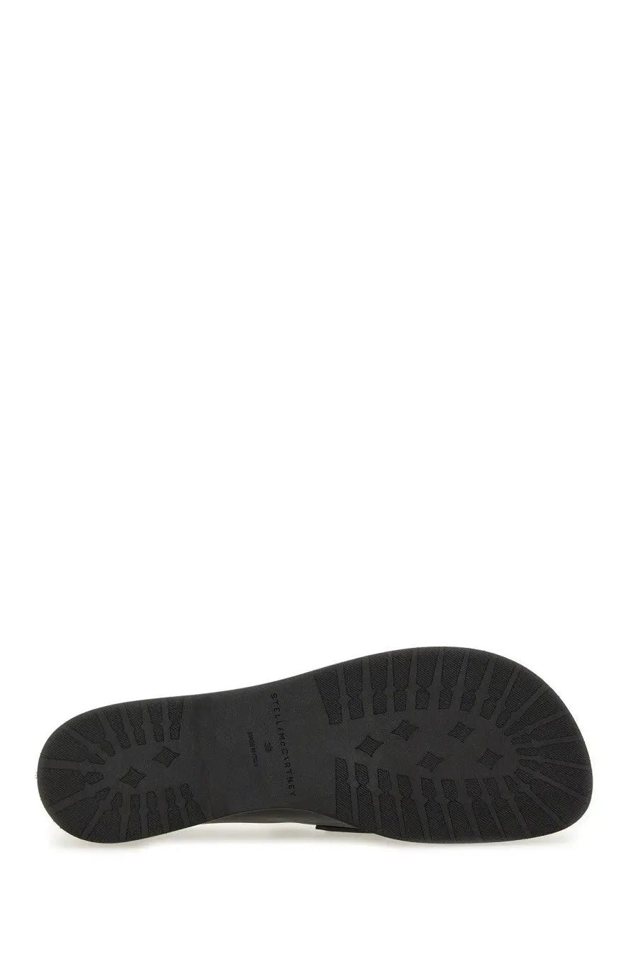 Black rubber sole with textured tread and embossed stella mccartney brand name on womens classic loafer ryder black