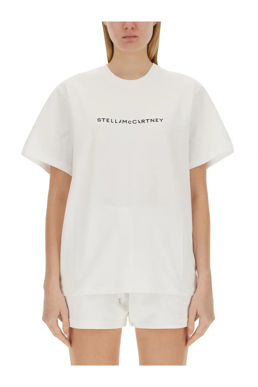 White Stella McCartney women’s cotton oversized t-shirt with black logo print across the chest