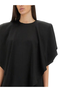 Black cape-style top by Stella McCartney with flowing draped fabric and relaxed fit in soft black material