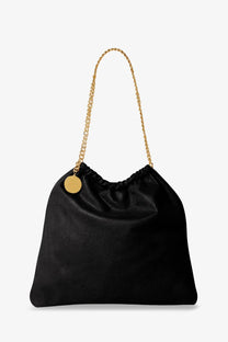 Black leather Stella McCartney falabella shaggy deer tote bag with gold chain strap and circular metal tag