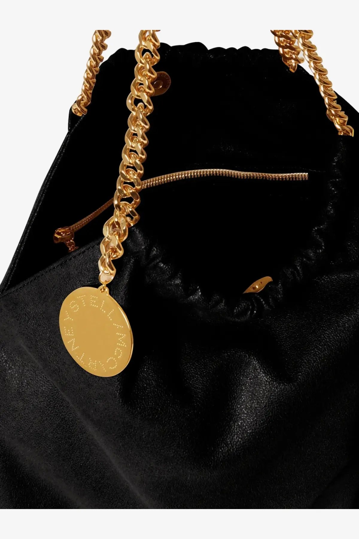Stella McCartney women’s falabella shaggy deer shoulder bag black velvet with gold-tone chain strap and circular brand tag