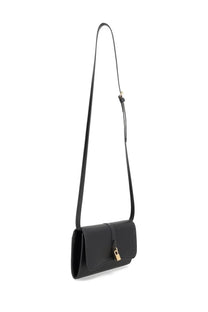 Stella McCartney women’s black leather crossbody flap Ryder bag with gold-tone padlock clasp