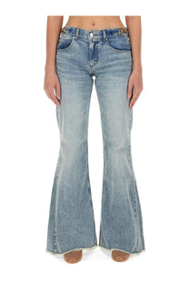 Stella McCartney women’s bootcut blue jeans in light-wash denim with frayed hems and gold-tone belt loops
