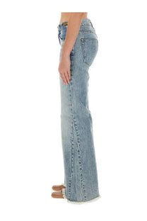 Stella McCartney women’s light-wash denim bootcut jeans with frayed hem and subtle distressing